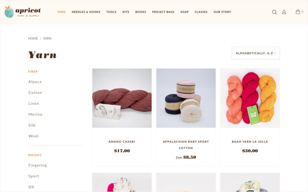 website rolls of knitting yarns of various colors and prices