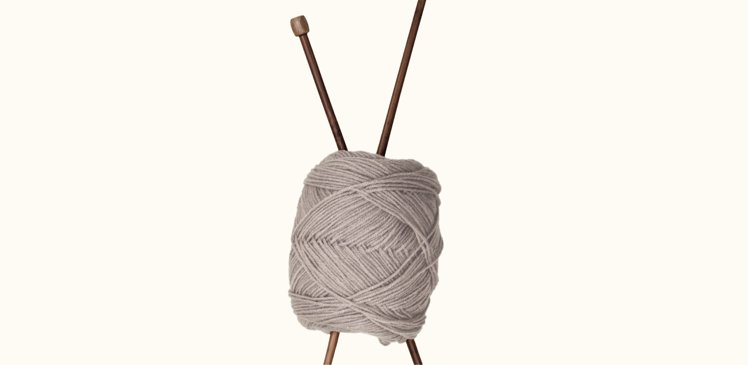 roll of white knitting yarn