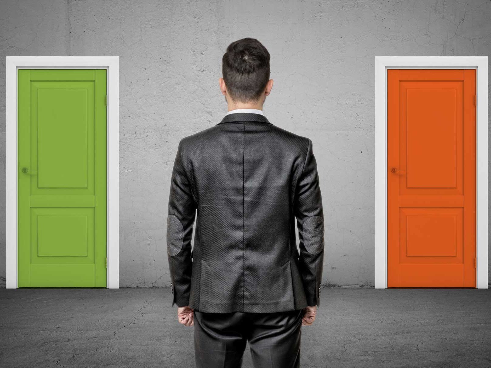 man choosing which door open