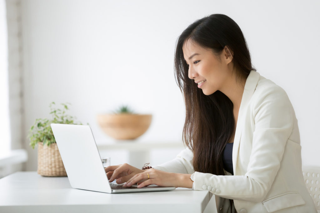 woman using computer for email marketing