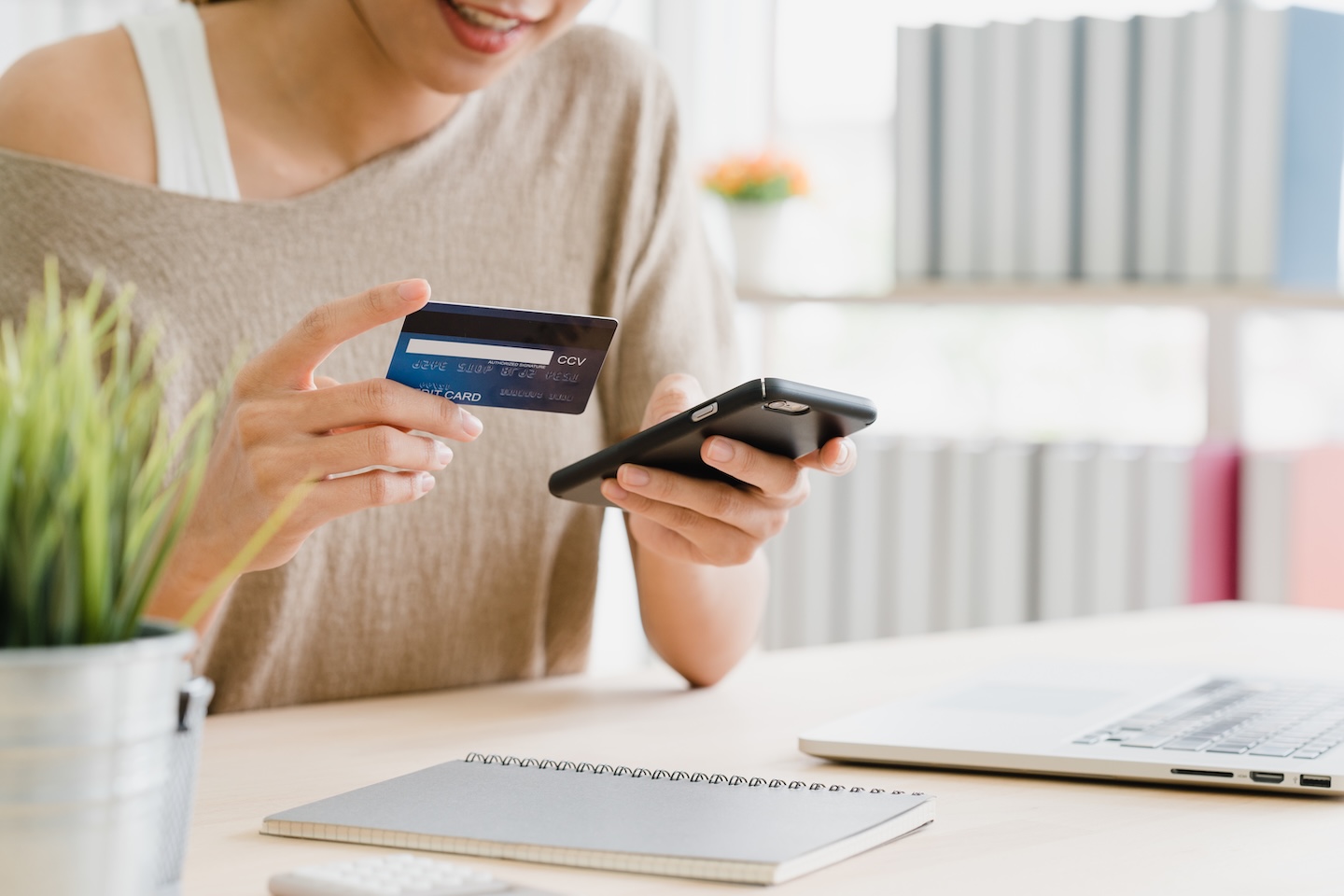 Shopper browsing a mobile ecommerce site for Black Friday and Cyber Monday deals