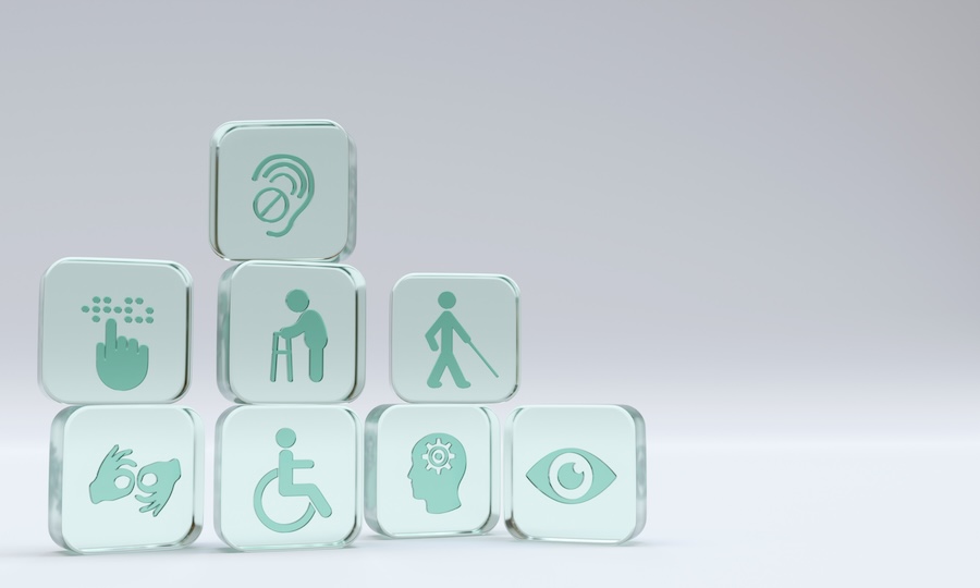 Glass blocks showing accessibility icons for disabilities.